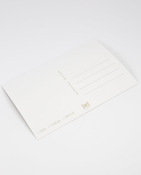 Rückseite einer weißen Postkarte mit Linienfeld für die Adresse, kleinem [oe]-Logo unten mittig und Auswahlkästchen mit den Beschriftungen „ADIEDA“, „TSCHÖÖ, WA!“ und „MACH ET JOT“ unten links.